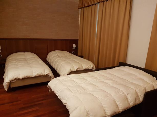 Imagen de la habitación del Hotel Dado International. Foto 12