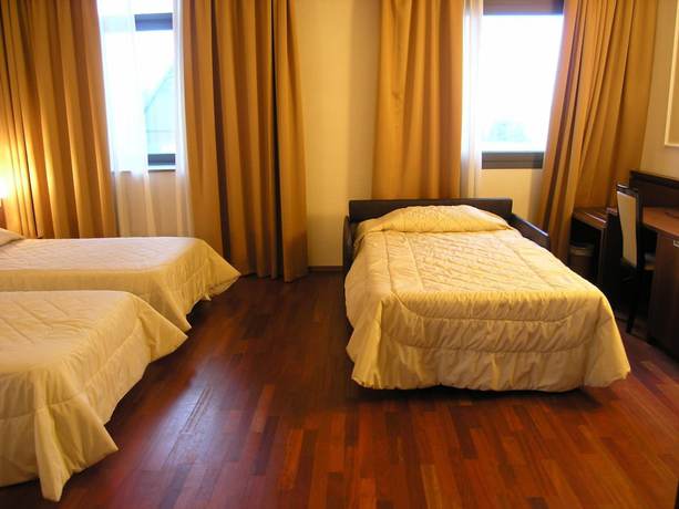 Imagen de la habitación del Hotel Dado International. Foto 13
