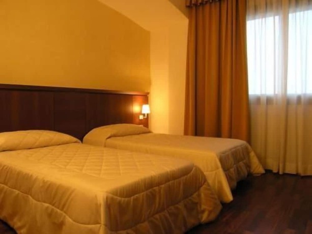 Imagen de la habitación del Hotel Dado International. Foto 15