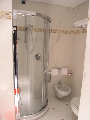 Imagen de la habitación del Hotel Dado International. Foto 16