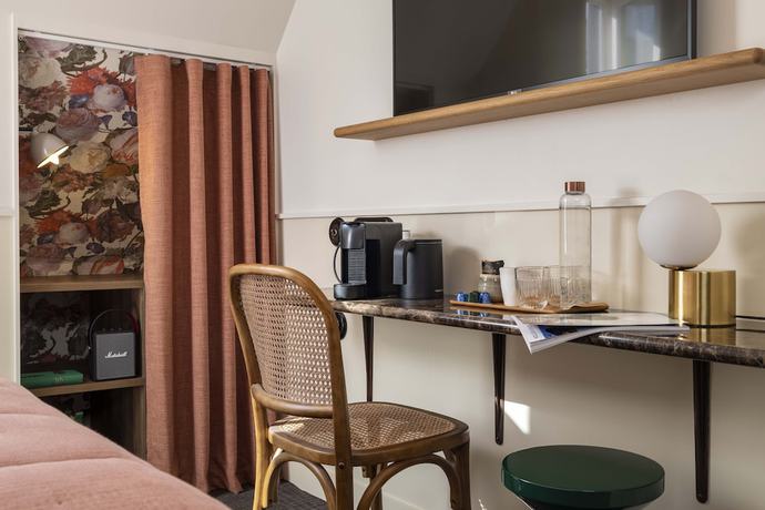 Imagen de la habitación del Hotel Dadou Paris. Foto 6
