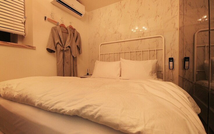 Imagen de la habitación del Hotel Daegu Italian Summer. Foto 3