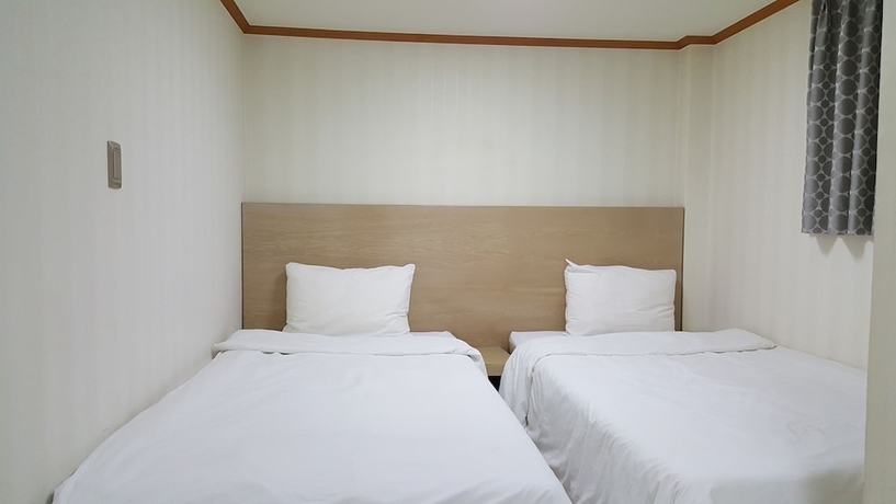 Imagen de la habitación del Hotel Daewoo Inn. Foto 9