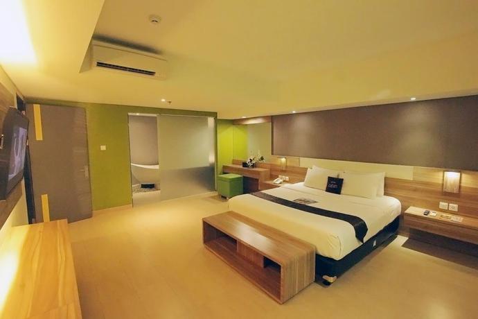 Imagen de la habitación del Hotel Dafam Fortuna Seturan. Foto 9