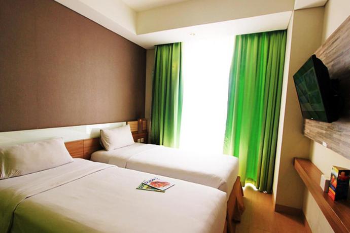 Imagen de la habitación del Hotel Dafam Fortuna Seturan. Foto 11