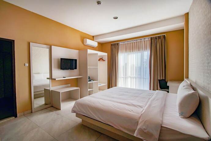 Imagen de la habitación del Hotel Dafam Resort Belitung. Foto 13