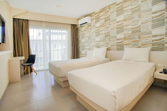 Imagen de la habitación del Hotel Dafam Resort Belitung. Foto 14