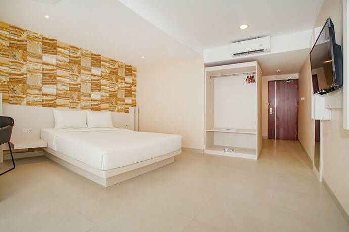 Imagen de la habitación del Hotel Dafam Resort Belitung. Foto 15