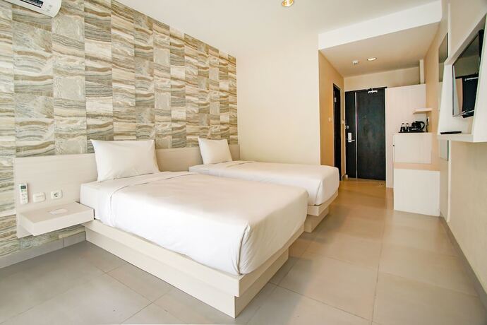 Imagen de la habitación del Hotel Dafam Resort Belitung. Foto 16