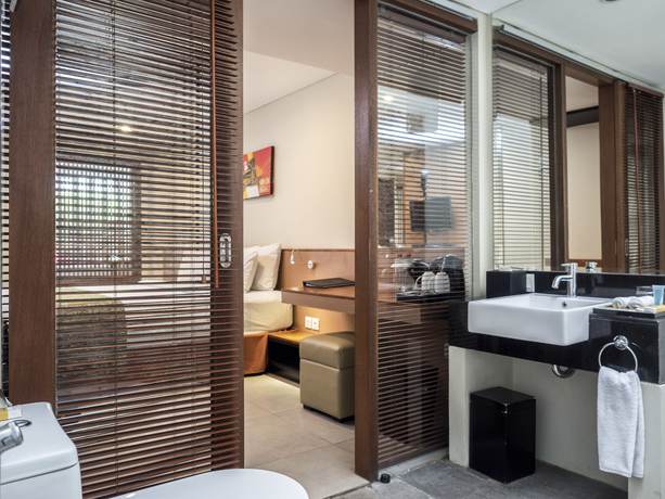 Imagen de la habitación del Hotel Dafam Savvoya Seminyak Bali - Chse Certified. Foto 7