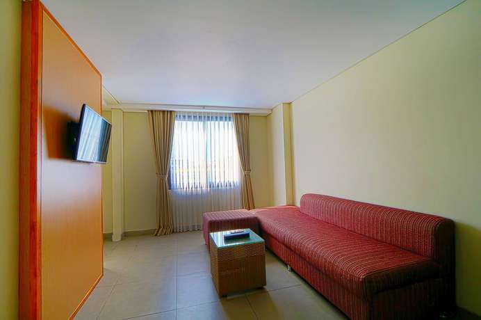 Imagen de la habitación del Hotel Dafam Savvoya Seminyak Bali - Chse Certified. Foto 12