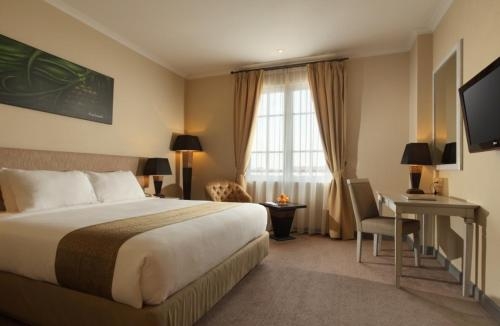 Imagen de la habitación del Hotel Dafam Semarang. Foto 6