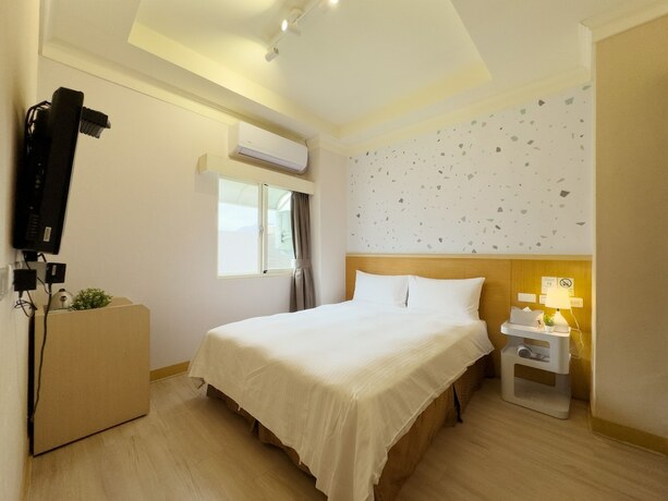 Imagen de la habitación del Hotel Dah Sing. Foto 17