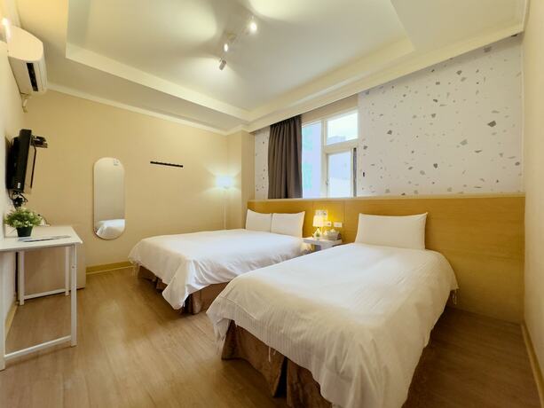 Imagen de la habitación del Hotel Dah Sing. Foto 18