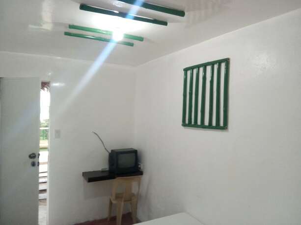 Imagen de la habitación del Hotel Dahilig Resort. Foto 17