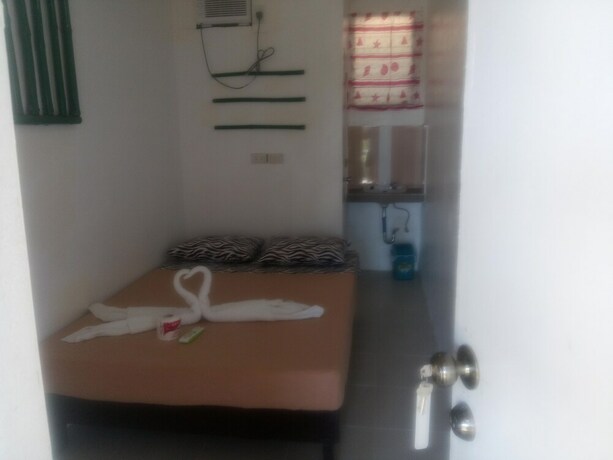 Imagen de la habitación del Hotel Dahilig Resort. Foto 19