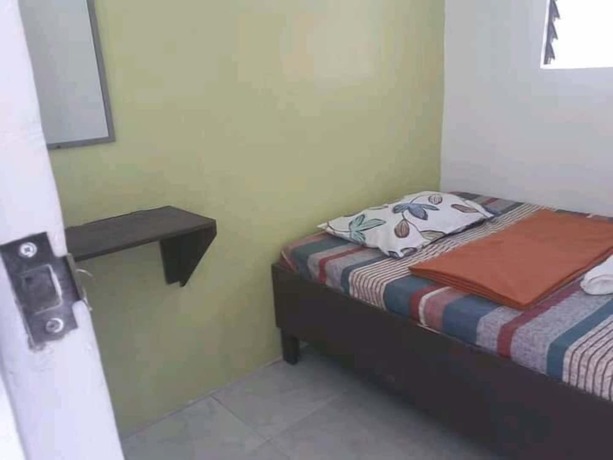 Imagen de la habitación del Hotel Dahilig Resort. Foto 21