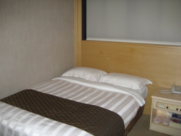 Imagen de la habitación del Hotel Dahshin, Taipei. Foto 8