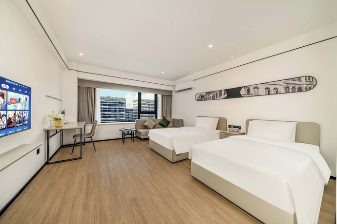 Imagen de la habitación del Hotel Dahua Group Xinn. Foto 3