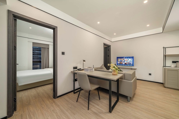 Imagen de la habitación del Hotel Dahua Group Xinn. Foto 4