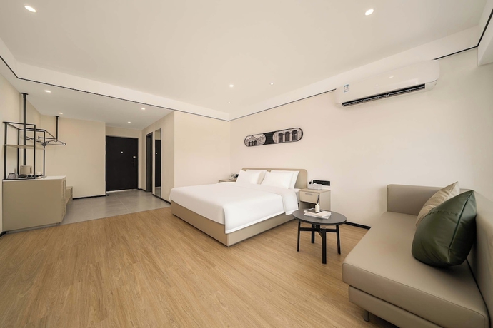 Imagen de la habitación del Hotel Dahua Group Xinn. Foto 6