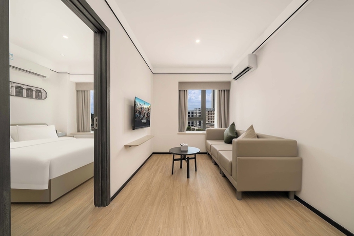 Imagen de la habitación del Hotel Dahua Group Xinn. Foto 11