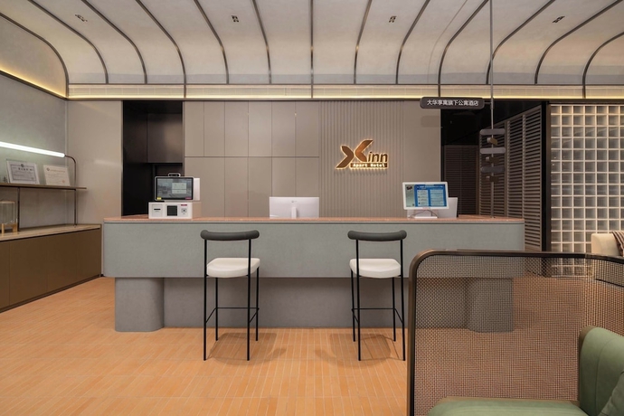 Imagen de los interiores del Hotel Dahua Group Xinn. Foto 12