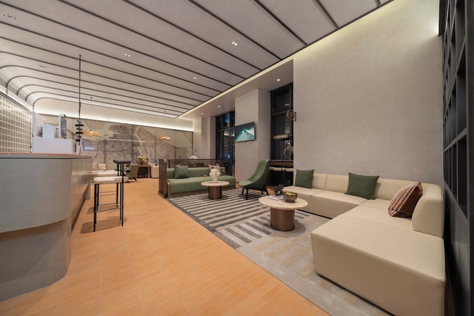 Imagen de los interiores del Hotel Dahua Group Xinn. Foto 13