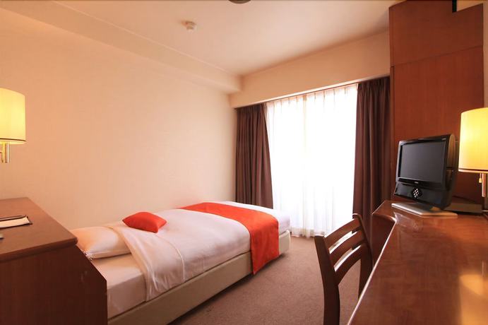 Imagen de la habitación del Hotel Daiichi Grand Kobe Sannomiya. Foto 2