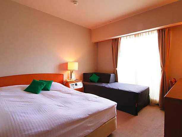 Imagen de la habitación del Hotel Daiichi Grand Kobe Sannomiya. Foto 8