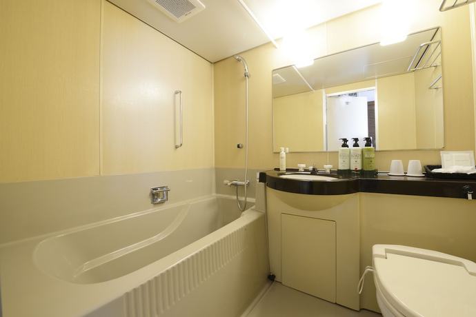 Imagen de la habitación del Hotel Daiichi Grand Kobe Sannomiya. Foto 11