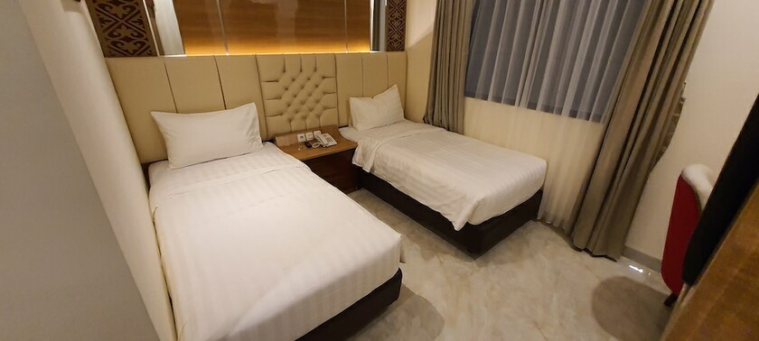 Imagen de la habitación del Hotel Daily Inn Bandung. Foto 19
