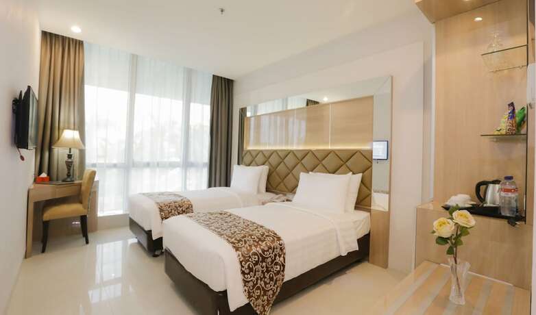 Imagen de la habitación del Hotel Daily Inn Jakarta. Foto 18