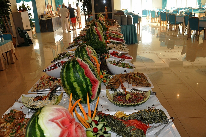 Imagen del bar/restaurante del Hotel Daima Biz - Dolusu Aquapark Access. Foto 6