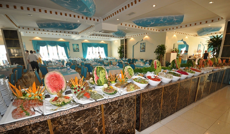 Imagen del bar/restaurante del Hotel Daima Biz - Dolusu Aquapark Access. Foto 7