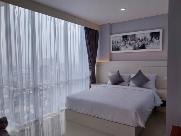 Imagen de la habitación del Hotel Daima Suites Margonda. Foto 4