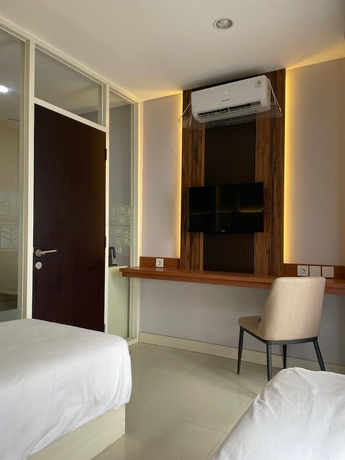 Imagen de la habitación del Hotel Daima Suites Margonda. Foto 13