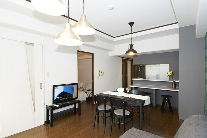 Imagen de la habitación del Hotel Dai-san Okamoto Building. Foto 24