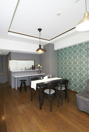 Imagen de la habitación del Hotel Dai-san Okamoto Building. Foto 25