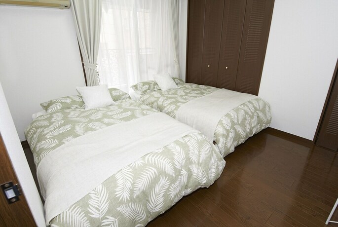 Imagen de la habitación del Hotel Dai-san Okamoto Building. Foto 27