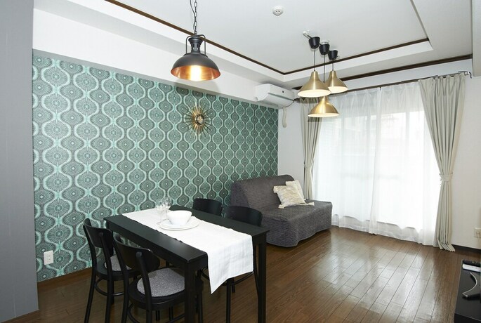 Imagen de la habitación del Hotel Dai-san Okamoto Building. Foto 28