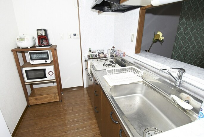 Imagen de la habitación del Hotel Dai-san Okamoto Building. Foto 29