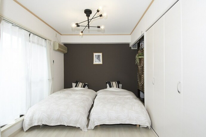 Imagen de la habitación del Hotel Dai-san Okamoto Building. Foto 31