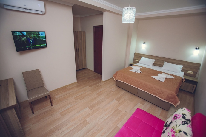 Imagen de la habitación del Hotel Daisi-sunset. Foto 6