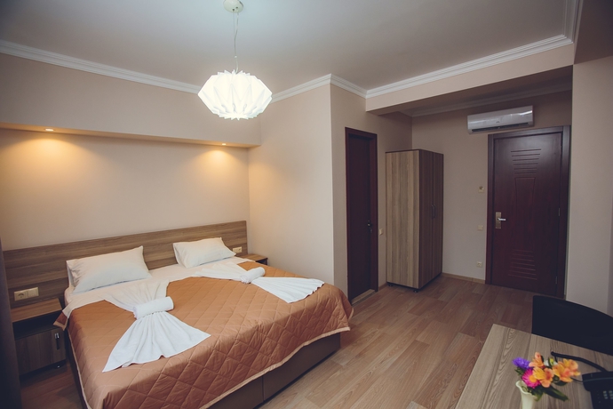 Imagen de la habitación del Hotel Daisi-sunset. Foto 7