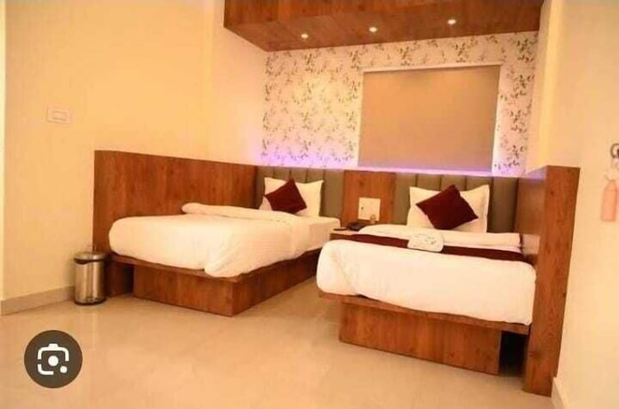 Imagen de la habitación del Hotel Daisy, Dispur. Foto 14