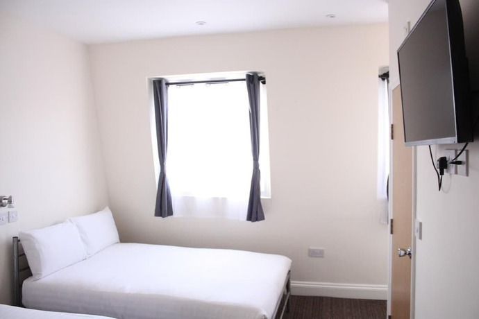Imagen de la habitación del Hotel Daisy Kings Cross. Foto 11
