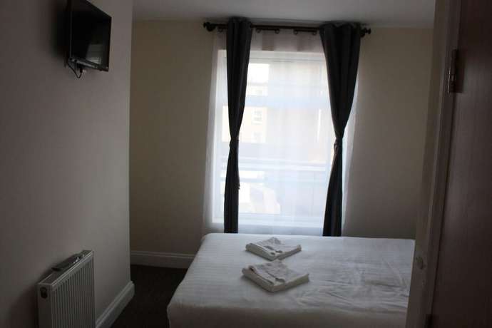 Imagen de la habitación del Hotel Daisy Kings Cross. Foto 16