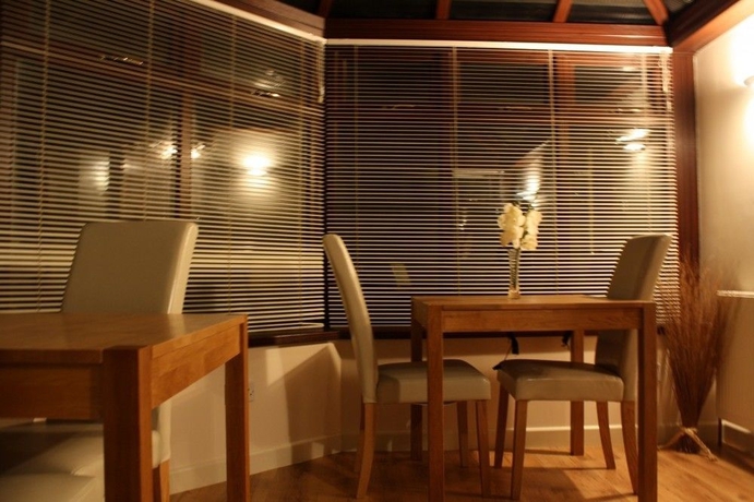 Imagen del bar/restaurante del Hotel Daisythorne Bungalow B and B. Foto 3