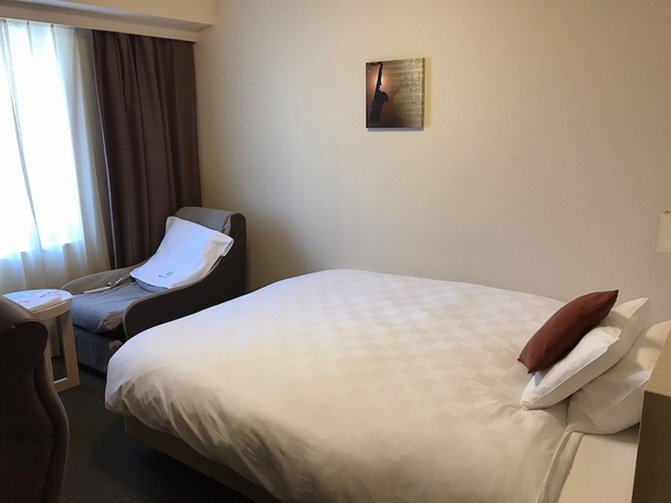 Imagen de la habitación del Hotel Daiwa Roynet Hamamatsu. Foto 9